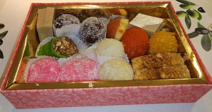 Assorted Indian mithai gift box of barfi, ladoo and gulab jamun at Lovely Sweets Calgary